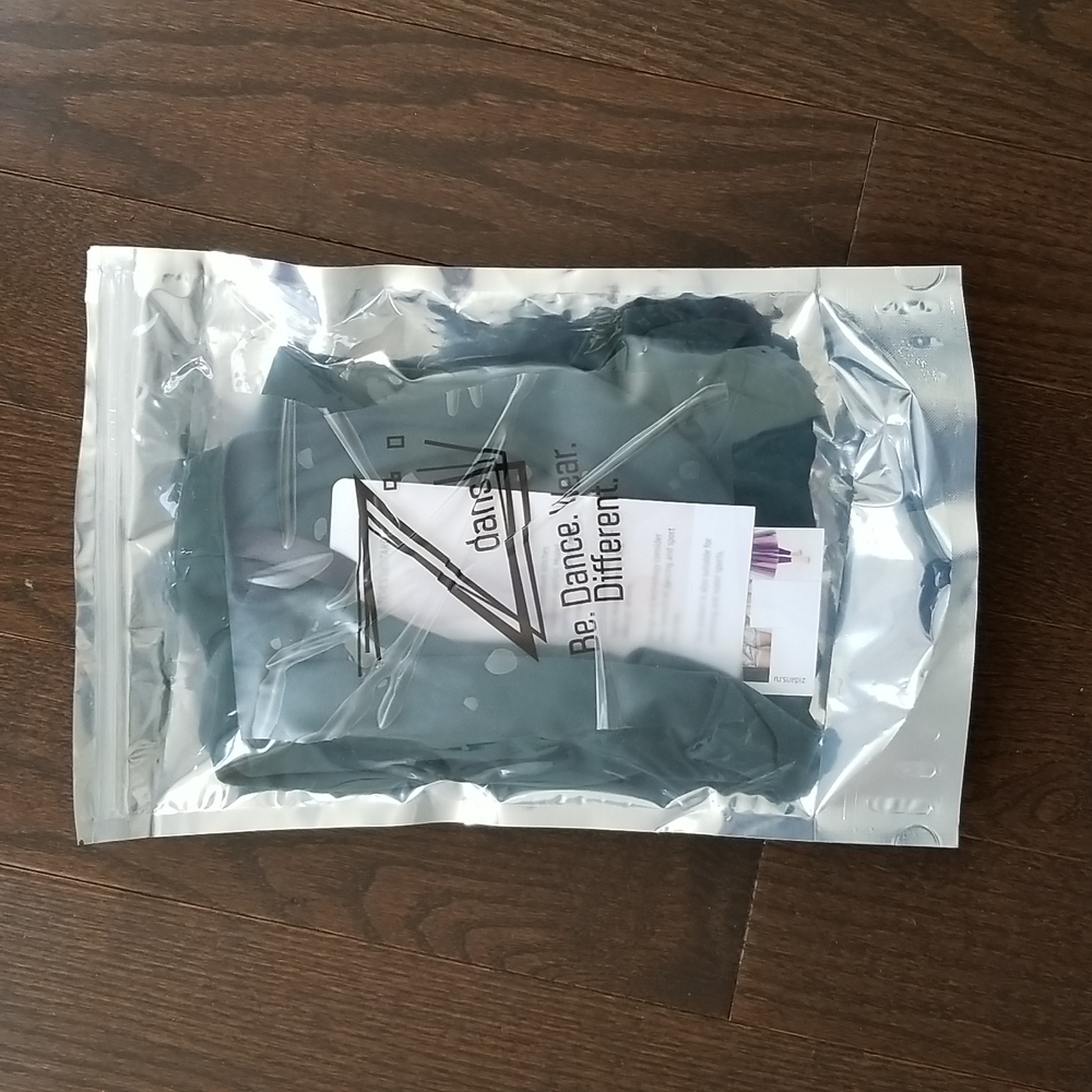 HOLD FOR EMMA S. Zidans Green leotard